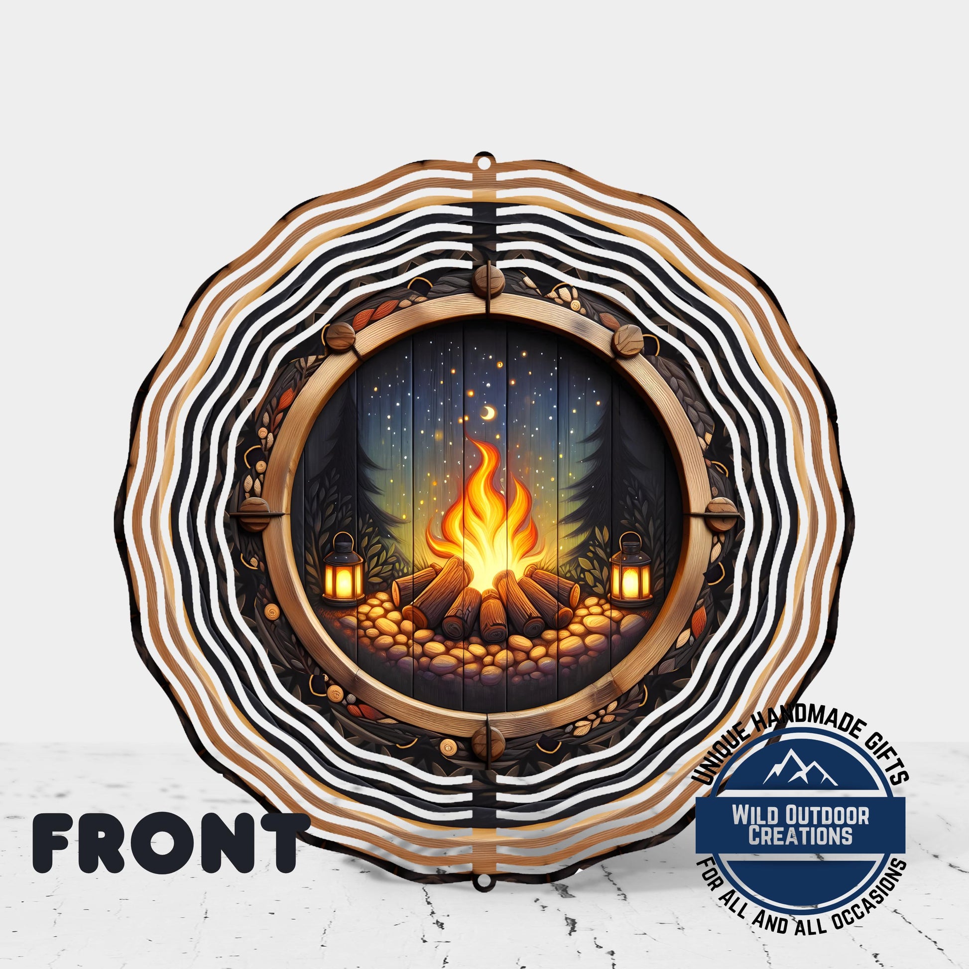 a decorative metal wind chime with a fire pit design, surrounded by a circular frame with a wavy border.