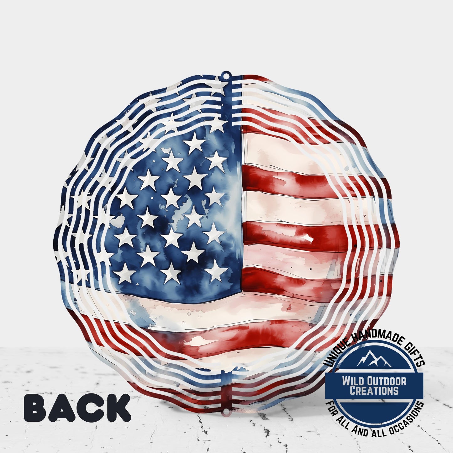 an American flag design with a wavy border and a circular shape, resembling a windmill or pinwheel.