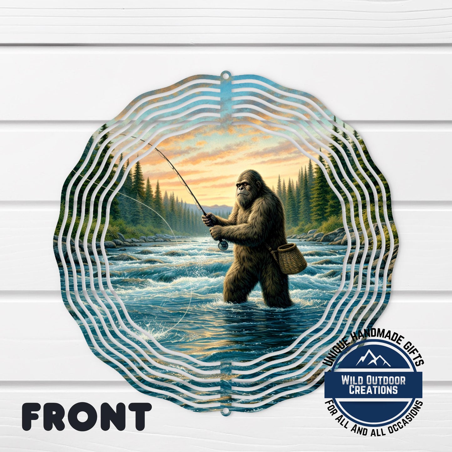 A large, circular metal decoration featuring a depiction of a giant, furry creature fishing in a river, surrounded by a wavy, repeating pattern.