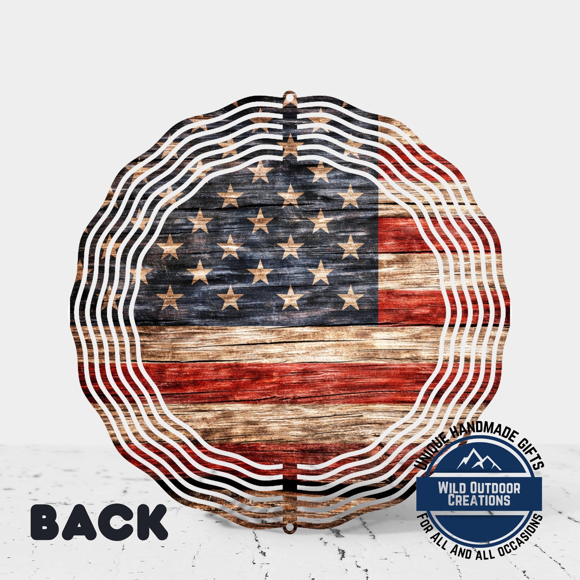 a large American flag-themed decoration with a wavy, rustic appearance.