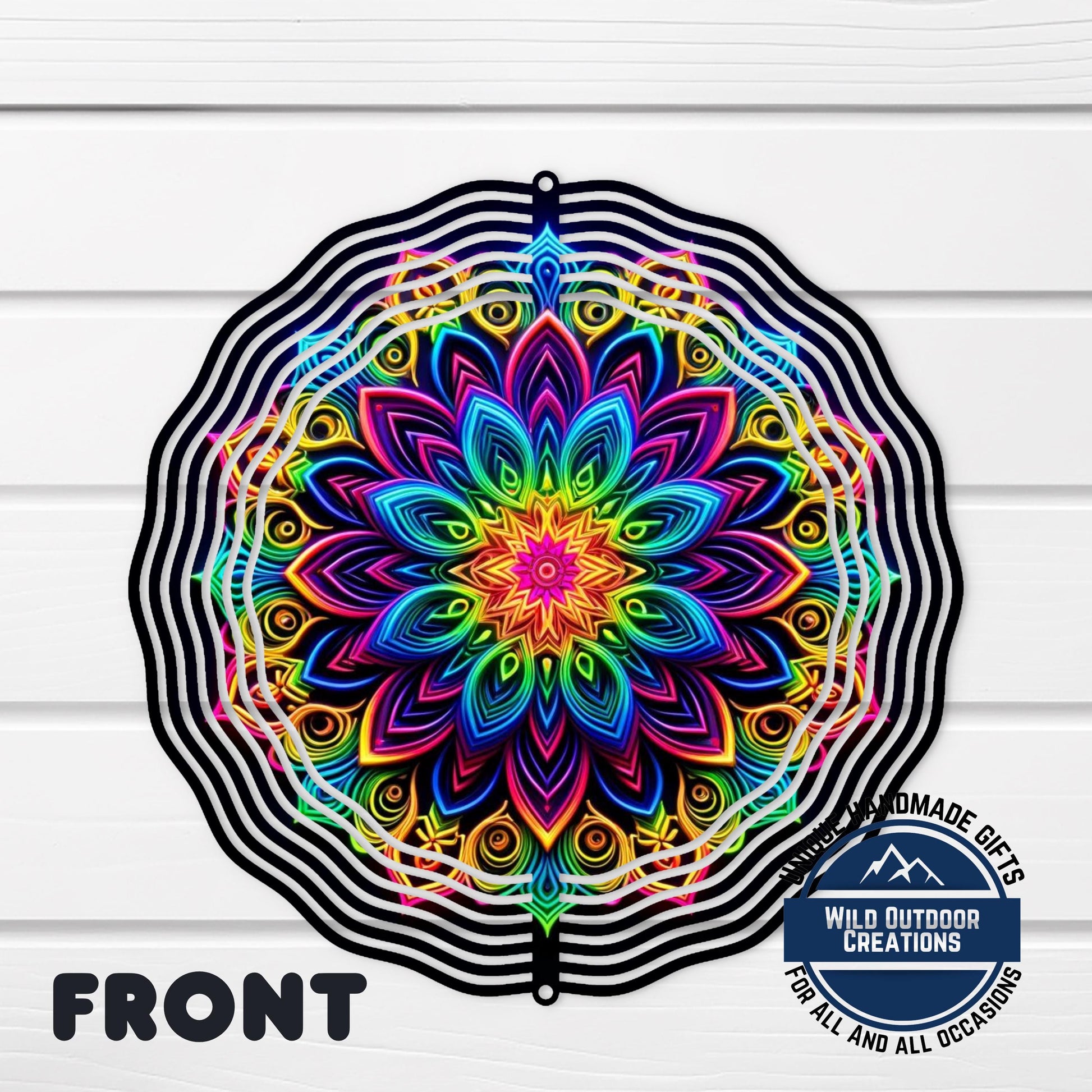 Neon Rainbow Wind Spinner – 10 Inch Mandala Double-Sided Aluminum Yard Art - shown spinning in outdoor garden setting